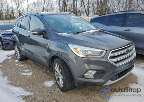 2017 Ford Escape Titanium z USA, uszkodzony, nr VIN 1FMCU9JD9HUF03713